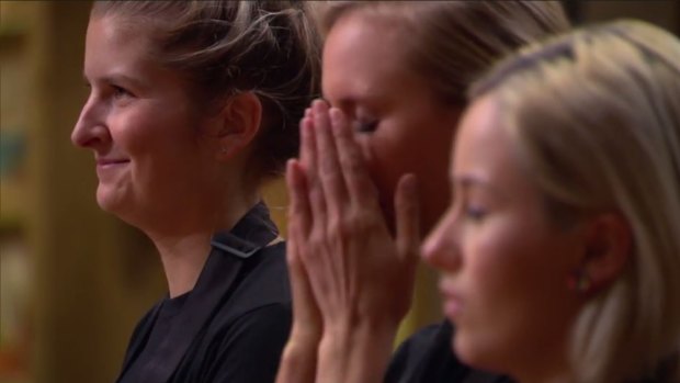 Karlie's face (centre) when George Calombaris announced that Eliza (left)had been eliminated from MasterChef.