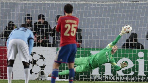 Manchester City's goalkeeper Joe Hart can't quite reach a penalty from CSKA's Bebras Natcho.