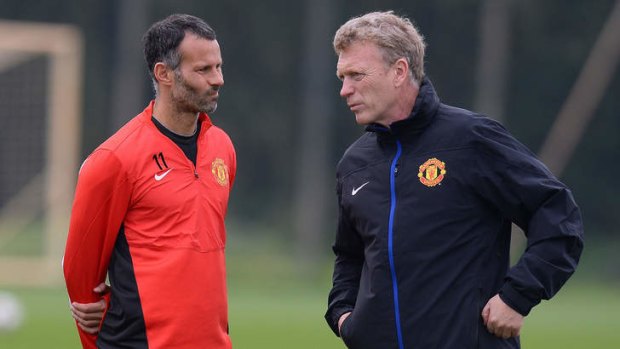Former Manchester United manager David Moyes (right) with Welsh midfielder Ryan Giggs.
