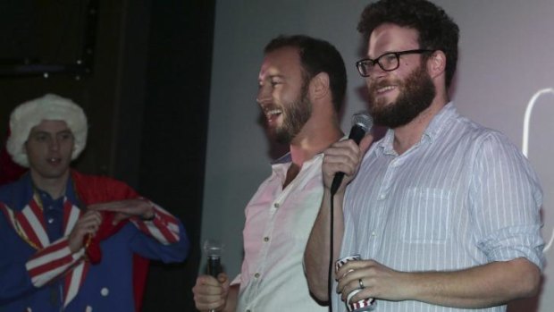 Co-directors Evan Goldberg (left) and Seth Rogen thanked attendees at a midnight screening of <i>The Interview</i> at the Silent Movie Theatre in Los Angeles.