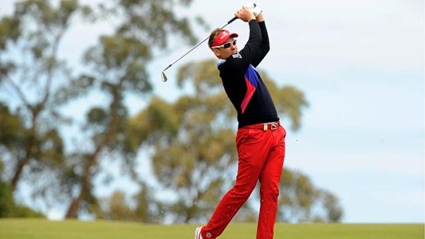 Bright start. Ian Poulter was hard to miss early in his third round.