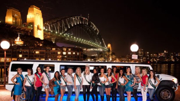 The 24 contestants of the Miss Earth Australia pose before a hummer.