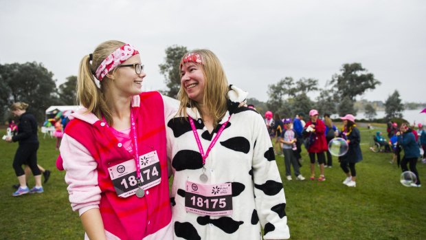 Team effort: Megan Peters and mum Sharon, of Dunlop, relax after running in onesies. 