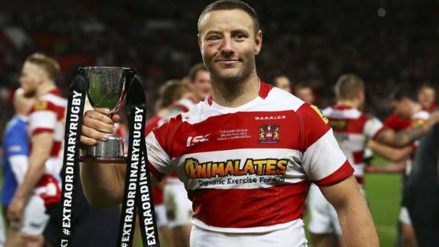 Wigan's Blake Green poses with the Harry Sunderland trophy following his team's 30-16 victory during the Super League Grand Final between Warrington Wolves and Wigan Warriors at Old Trafford.