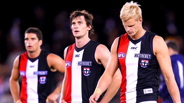 St.Kilda's Leigh Montagna, Farren Ray and Nick Riewoldt after losing to Essendon.