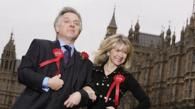 Larger than life: Rik Mayall and Marsha Fitzalan as the ruthless politician Alan B'Stard and wife Sarah in The New Statesman in 2006.