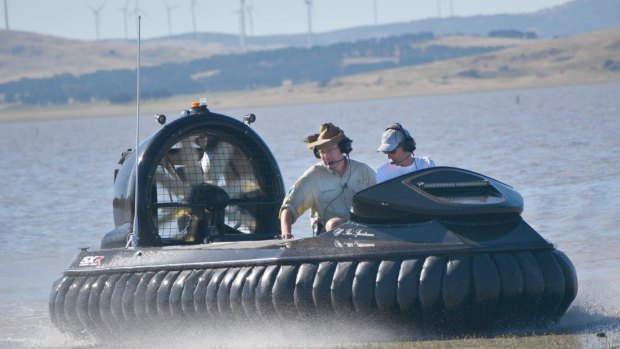 Tim the Yowie Man joins Mick Nell on a hovercraft flight around Lake George.