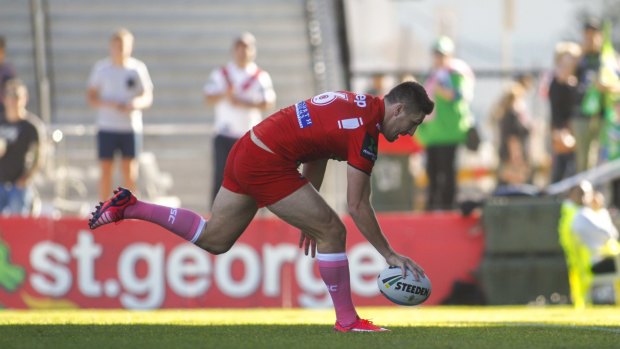 Touchdown: St George Illawarra five-eighth Gareth Widdop plants the ball over the stripe. 