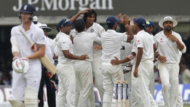 India celebrate the wicket of Ben Stokes.
