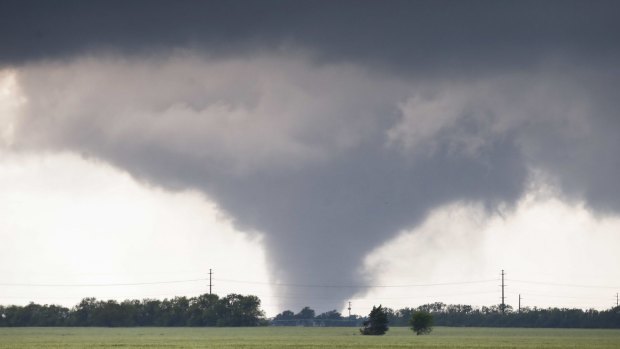 A large tornado passes just to the west of the city of Halstead, Kansas. A swath of the Great Plains was under a tornado watch, including parts of North Texas, Oklahoma, Kansas and Nebraska. 