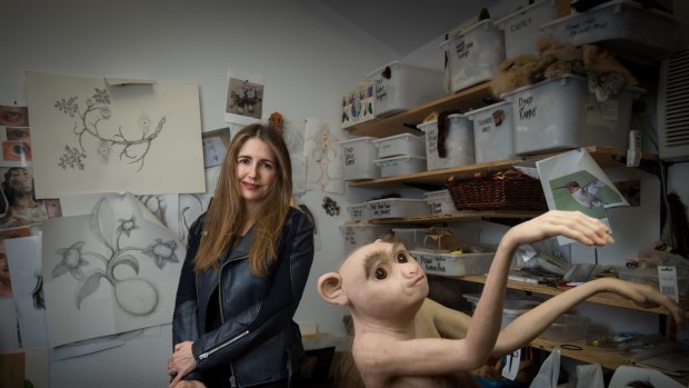 Patricia Piccinini in her Collingwood studio with one of her new pieces, The Pollinator.