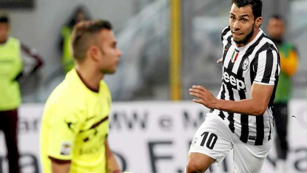 The winner: Carlos Tevez celebrates after scoring for Juventus against Livorno.
