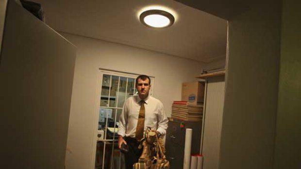 Bunkered down: Justin Bowden with a protective vest in his Sydney headquarters.