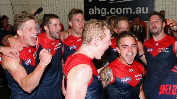 Friend like Ben: Ben Kennedy (inner right) enjoys his first rendition of the Melbourne song.