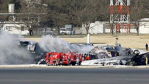 A cargo jet has burst into flames at Narita Airport.