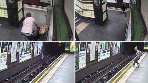 A child in a pram is blown on to subway tracks at Goodge Street underground station, London.