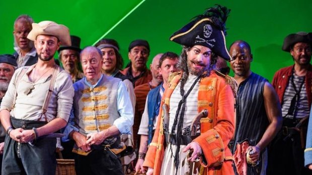 Joshua Bloom as the Pirate King and members of ENO's chorus in the <i>Pirates of Penzance</i>.