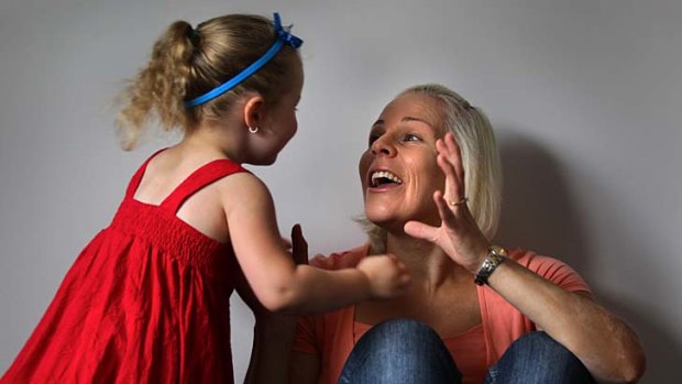 Insight: Nicholle Marks who received a corneal transplant in 2011, and her daughter Katie,2.