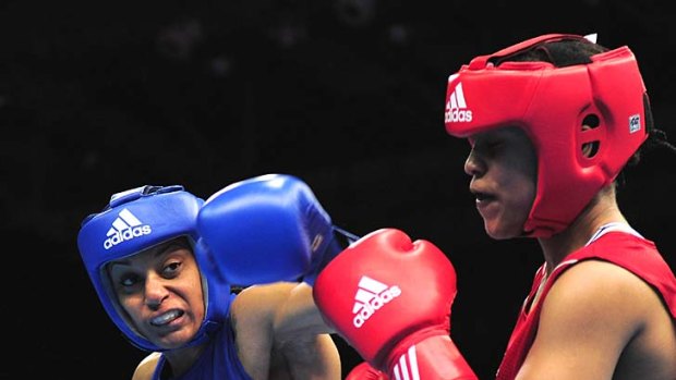 Quanitta Underwood fights Natasha Jonas of Great Britain in the Olympic test event in London last November.