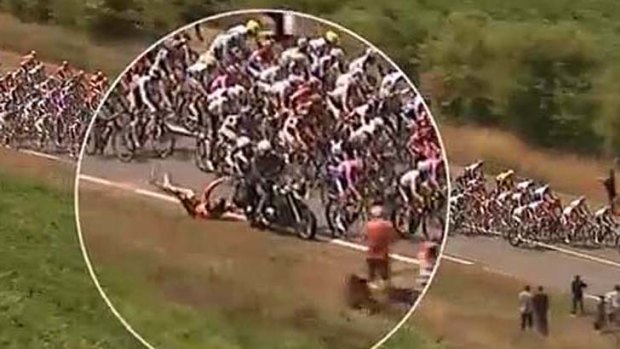 Crash ... a motorbike rider has been kicked off the Tour de France after being involved in an accident with Danish rider Nicki Sorensen.