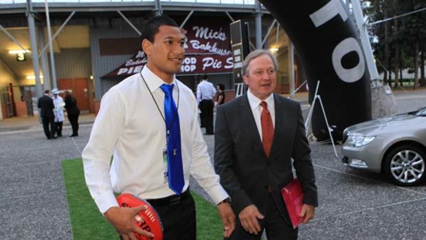 Main attractions . . . star recruit Israel Folau and coach Kevin Sheedy at the launch last night.