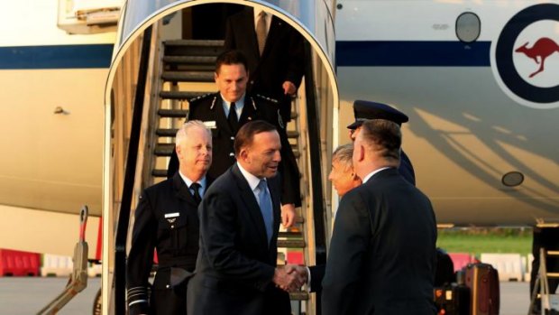 Prime Minister Tony Abbott arrives in The Netherlands.