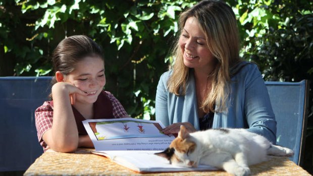 Community spirit: Privately educated Amy Miller has opted to send daughter Isabella to the local public school.