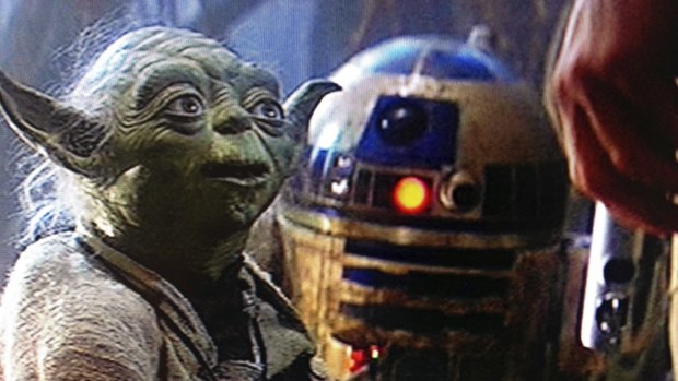 Yoda with R2D2 and Luke in <i>The Empire Strikes Back</i>.