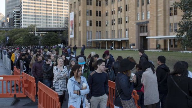 Hundreds of people queue outside the MCA in The Rocks to enter the <i>Game Of Thrones</i> exhibition.