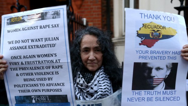 A protester outside the Ecuadorian embassy in London on Thursday. 