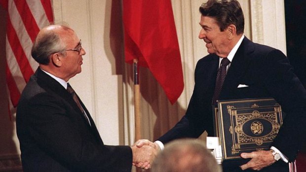 US president Ronald Reagan, right, shakes hands with Soviet leader Mikhail Gorbachev after the two leaders signed the Intermediate Range Nuclear Forces Treaty in 1987. 