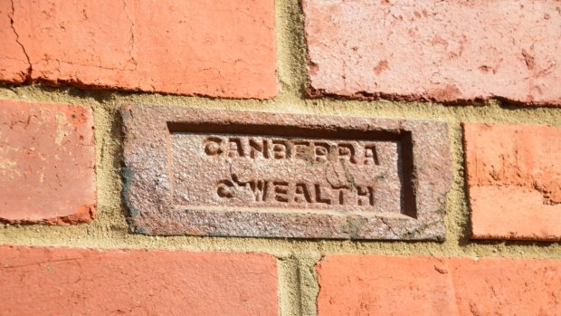  'Canberra red' bricks were salvaged by hand and stacked for cleaning prior to re-use in the new replacement house.
