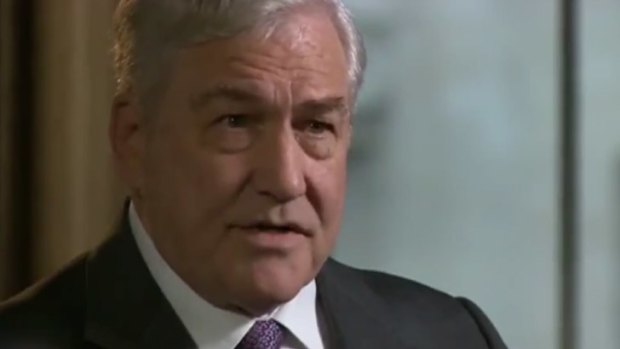 Threat ... Conrad Black being interviewed by Jeremy Paxman.