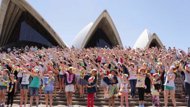 Enchanted morning: Sydneysiders gather at the Opera House to welcome performances of <i>South Pacific</i> at the venue.