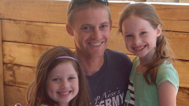 Grant Kirby with daughters Isabella and Madeleine.