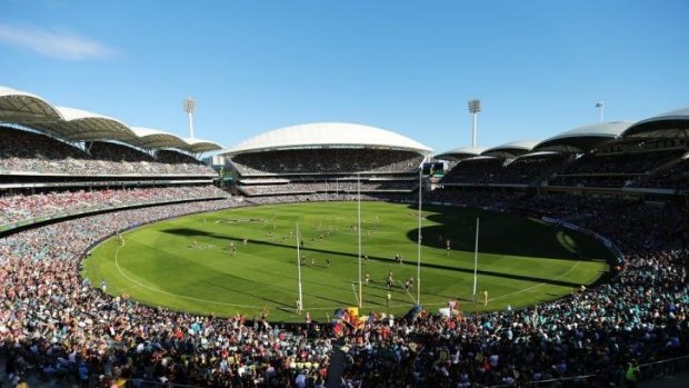Glory day: The sell-out crowd at the Adelaide Oval.