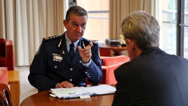NSW Police Commissioner Andrew Scipione will stay in the top job for a further 12 months.