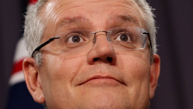 The prime minister applauded former immigration minister Scott Morrison. 