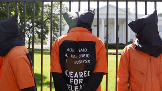 Reminder . . .  demonstrators outside the White House call for the closure of the Guantanamo Bay prison camp.