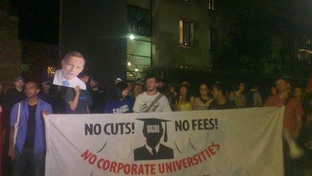 Students protest as Christopher Pyne visits St John's College at University of Sydney.