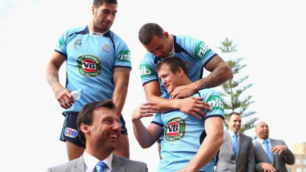 Laurie Daley, James Tamou, Josh Morris and Blake Ferguson look on during the Origin team photo session at Crowne Plaza, Coogee last year.