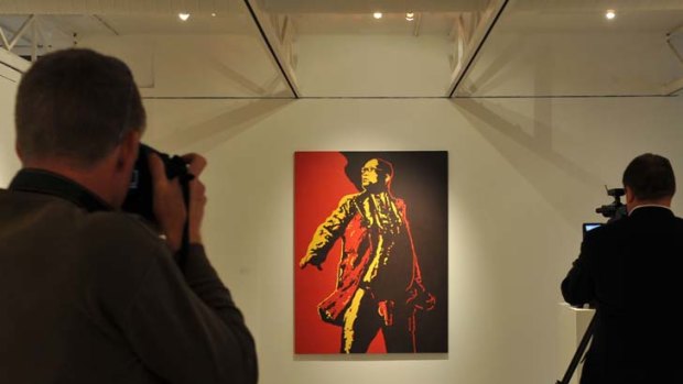The painting in a Johannesburg gallery has sparked national debate over issues of racism and freedom of speech.
