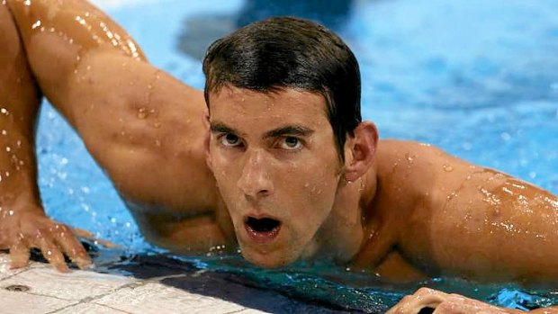 Michael Phelps leaves the pool after missing a medal in the men's 4x100m individual medley.