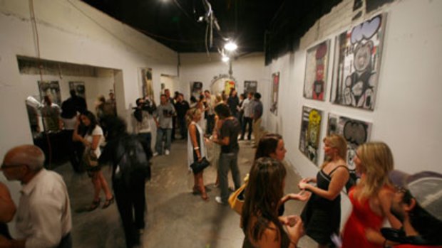 Party pooper  ... conversation and "cheap red wine" is no longer enough to entice opening-night crowds, says gallery owner Michael Reid.