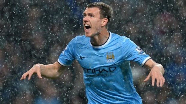 Reigning: Manchester City’s Edin Dzeko will be hoping he has a title to celebrate this weekend.