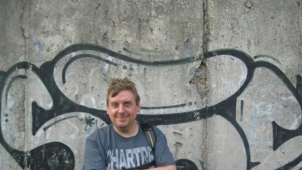 Jolyon Philcox, TripAdvisor's top contributor for 2014, in front of the Berlin Wall in Germany.