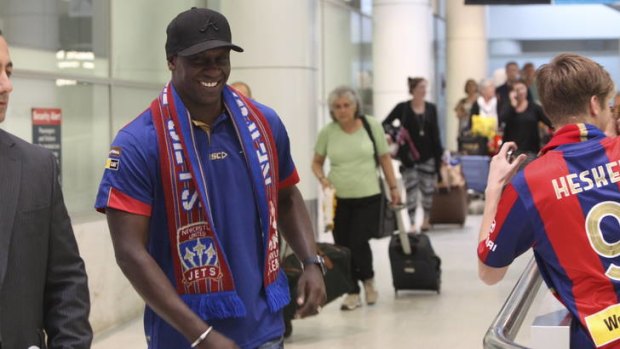 Emile Heskey arrives at Sydney Airport this morning.