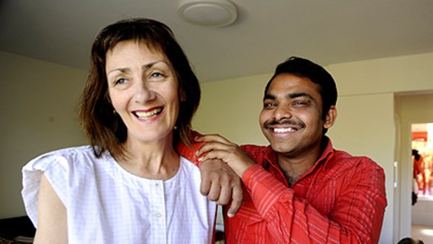 Guess who's coming to dinner? Patrice McCarthy with Indian student Praveen Sadhu, who will share a roast chicken dinner with her at her Fitzroy North flat tonight.