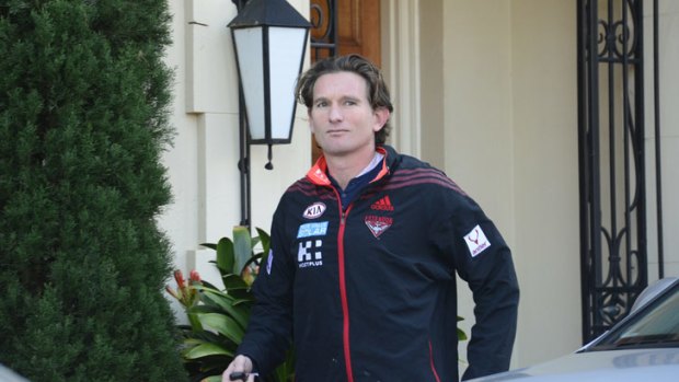 Essendon coach James Hird leaves his Toorak home on Monday morning.