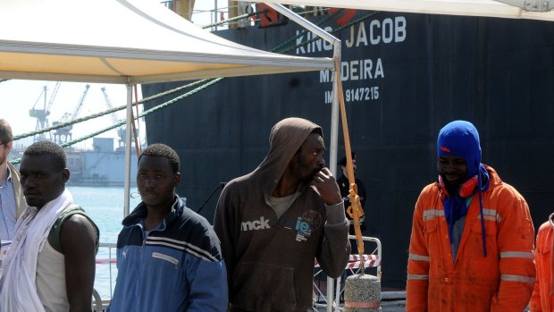 Asylum-seekers in Palermo harbour last week.  